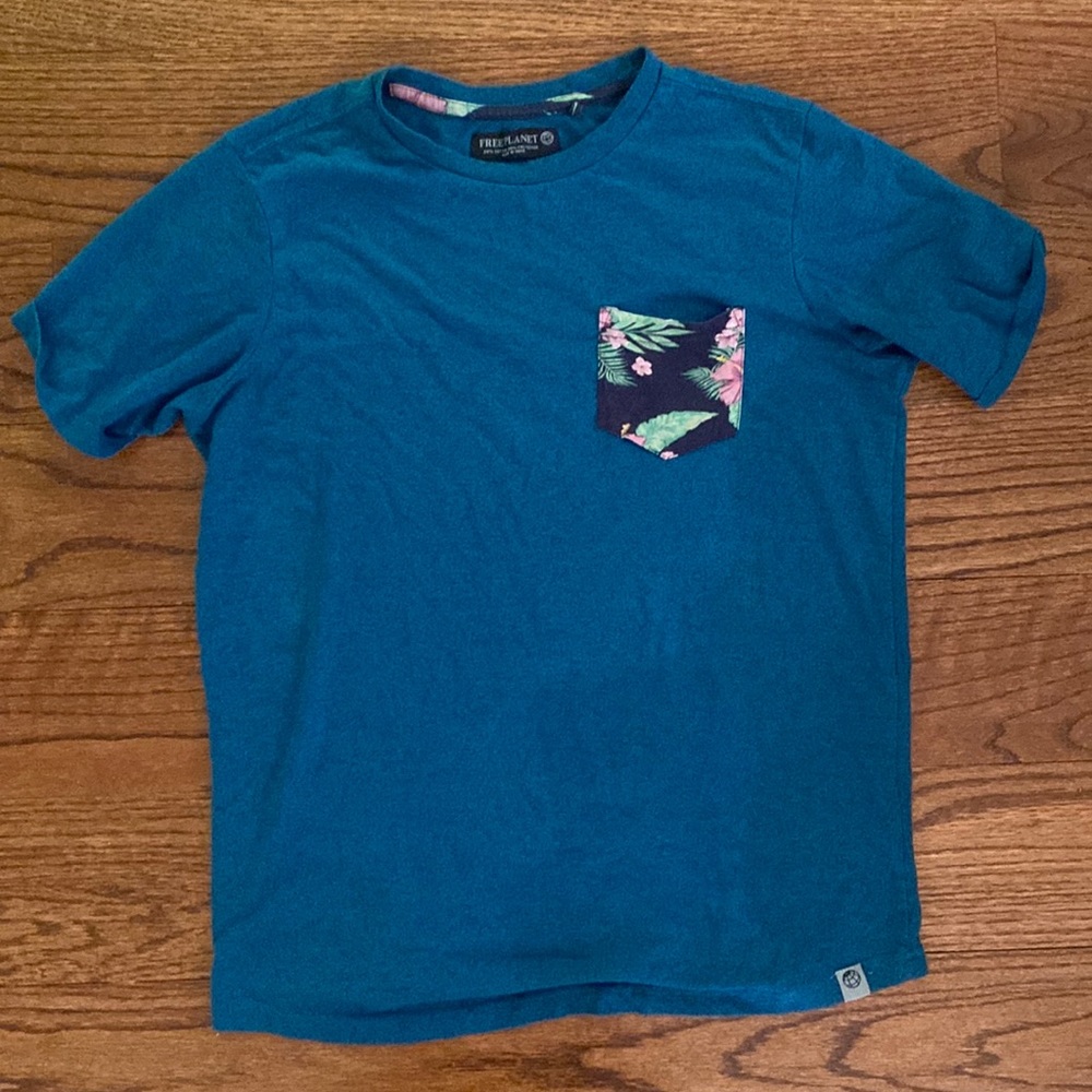 Mens blue pocket tee with tropical pattern
